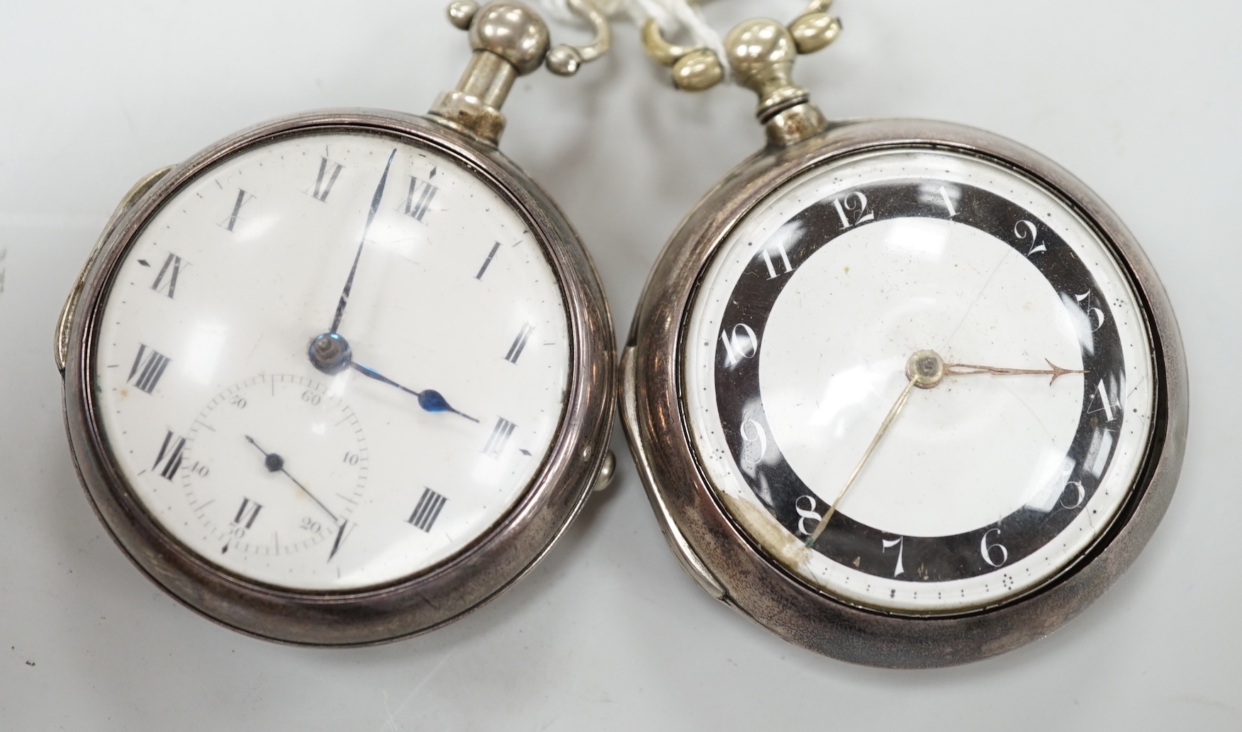 Two George III silver pair cased keywind verge pocket watches by Knight of Thaxted (black ring) and Spink of Windsor.